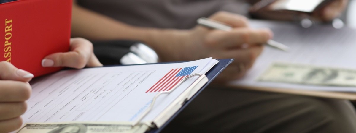 passport details application form. Briefing before an interview at US Embassy. Payment consular fee-Shutterstock_1693797880