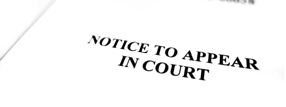 notice to appear in court NTA Shutterstock_2358391453